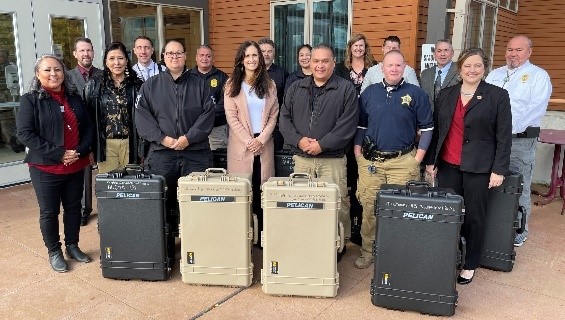 Group photo of AMBER Alert Training and Technical Assistance Program staff presenting technology toolkits to law enforcement officials from six Wisconsin Tribal Nations.