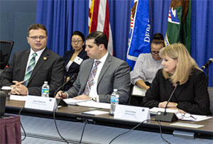 Jesse Panuccio, Principal Deputy Associate Attorney General (center), Matt M. Dummermuth, Principal Deputy Assistant Attorney General for the Office of Justice Programs (left), and Caren Harp, OJJDP Administrator, offered introductory remarks at the Coordinating Council meeting.