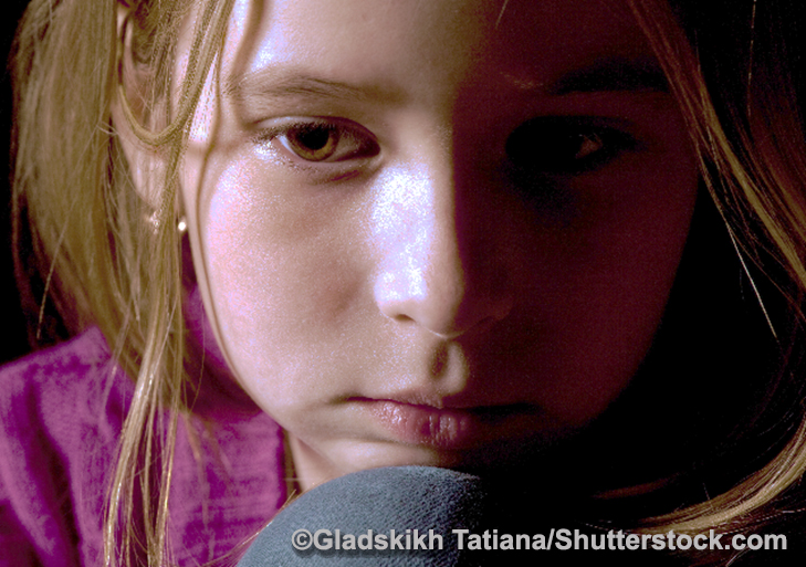 Photo of young, scared girl. Copyright: Gladskikh Tatiana/Shutterstock.com