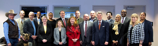 OJJDP leadership and staff gathered for a group photo with FACJJ members at the committee’s March 22, 2019, meeting. Back row from left to right: Judge David Hejmanowski, Kenneth Tramble, Tiffany Wilkerson-Franklin, Corey Haines, Korey Solomon, Anthony Pierro, Adolphus Graves, and Tina Borner. Front row from left to right: Thomas Rose, Judge Thomas Frawley, Elizabeth Wolfe, Melanie Shapiro, Kathryn Richtman, Richard Thompson, Michael Arrington, Chyrl Jones, and Caren Harp.