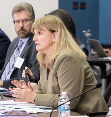 Administrator Caren Harp, Vice Chair of the Coordinating Council on Juvenile Justice and Delinquency Prevention, responds to a panel discussion on the opioid crisis at the Council’s March 14, 2019, meeting.