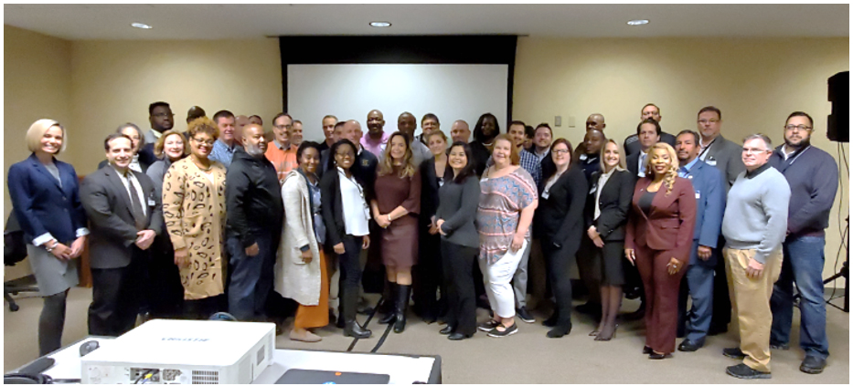 Representatives of OJJDP and sites participating in the Office’s gang  suppression and Safe and Thriving Communities initiatives gather for a group  photo at an October 22–24, 2019, training in Pittsburgh, PA.