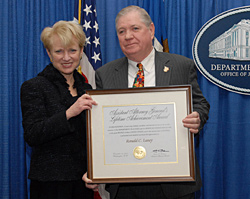 Photo of Assistant Attorney General Laurie O. Robinson and Ron Laney, then-Senior Advisor to the OJJDP Administrator.
