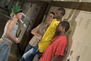 Photo of teenagers in a school hallway