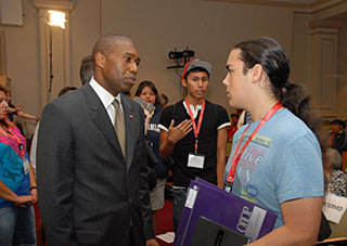 Acting Associate Attorney General Tony West sharing information with a participant in the National Intertribal Youth Summit
