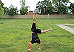 Carter Smith displays his gymnastics skills at the Dover Air Force Base youth center in Delaware.