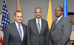 A photo of Attorney General Eric Holder (middle), Joe Torre (left), and Robert Listenbee, J.D. (right).