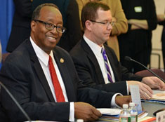OJJDP Administrator Robert L. Listenbee (left) and Acting Associate Attorney General Stuart F. Delery at the meeting of the Coordinating Council on Juvenile Justice and Delinquency Prevention