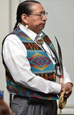 Clayton Old-Elk (Apsaalooke' Nation–Crow Nation) offers a traditional ceremonial opening at the November 18, 2014, meeting of the Coordinating Council on Juvenile Justice and Delinquency Prevention