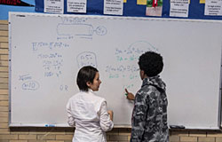 A tutor and student in Match Education's high-intensity math tutoring program, currently being evaluated in Chicago by the University of Chicago Crime Lab. Photo by Robert Kozloff/The University of Chicago.