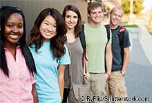 Photo of racially diverse group of smiling teens