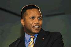 Claude A. Allen, Assistant to the President for Domestic Policy, speaking at Tuesday's luncheon plenary session.