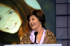 First Lady Laura Bush speaking at opening ceremony.