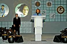 Assistant Attorney General Regina Schofield introduces Attorney General Alberto Gonzales during opening ceremony.