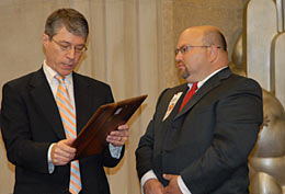 The Child Protection Award: (l. to r.) Deputy Attorney General Ogden and Detective Neil Spector of the St. Lucie County Sheriff's Office in Fort Pierce, FL.