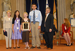The Missing Children 2009 Art Contest Winner: (l. to r.) Acting Assistant Attorney General Robinson; Doyoun Park, last year's art contest winner; Dakhota-Rae Brown, this year's winner; Paul Hartigan, art teacher; Deputy Attorney General Ogden.