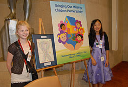 From l. to r.: Dakhota-Rae Brown, the 2009 winner of the National Missing Children's Day Art Contest, and Doyoun Park, the 2008 winner of the National Missing Children's Day Art Contest.