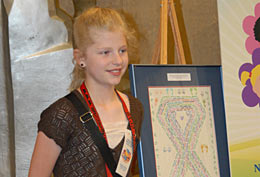 Dakhota-Rae Brown of Henderson Elementary School in Cheyenne, WY, with her winning entry in the 10th Annual National Missing Children's Day Poster Contest.