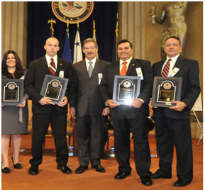 Deputy Attorney General James Cole (center) presented the Attorney General's Special Commendation Award Deputy Attorney General James Cole (center) presented the Attorney General's Special Commendation Award