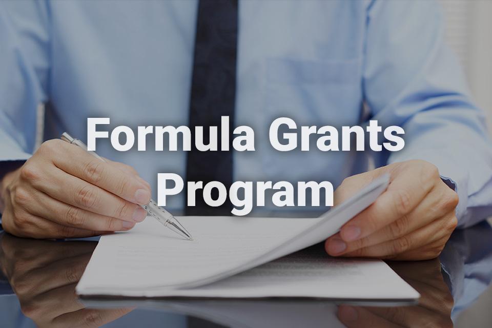 Formula Grants Program text written over a background image of male professional
