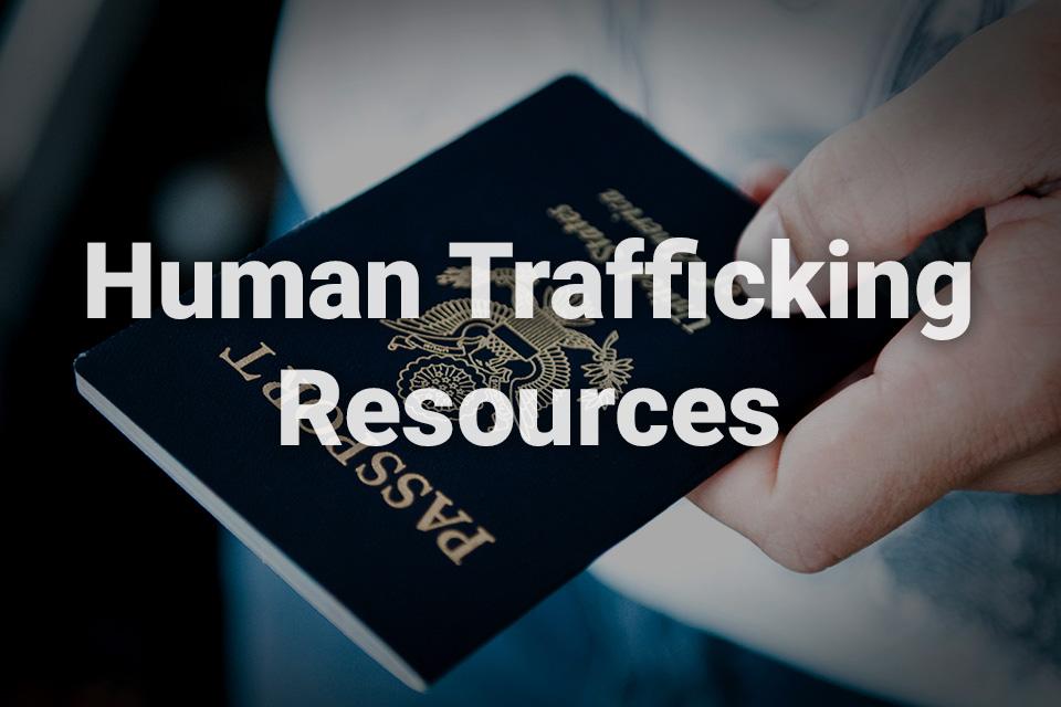 Human Trafficking Resources text written over a background image of individual holding passport