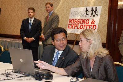 Slideshow - Attorney General Gonzales, with Michelle Collins of the National Center for Missing and Exploited Children - August 2006
