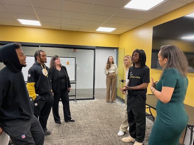 Youth co-lead site tour of Café Momentum Pittsburgh