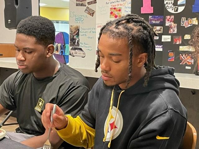 Pittsburgh Steelers player Dan Moore Jr., left, and Steelers teammate Calvin Austin III