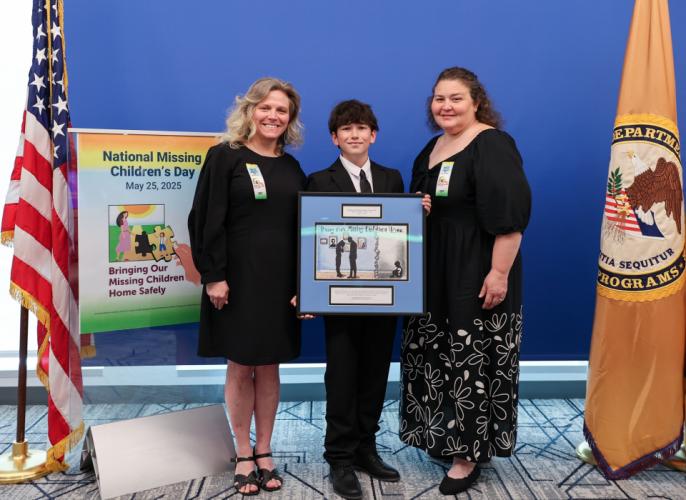 Jax S., the 2025 national poster contest winner and a fifth grader at Wellston Intermediate School in Ohio, with his teachers.