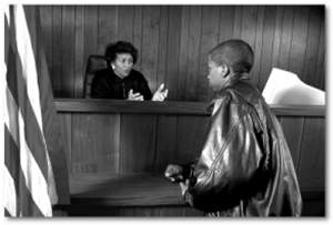 A photo of a youth in court.