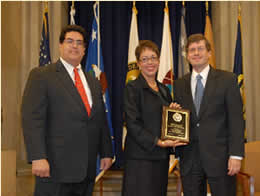 J. Robert Flores, Felicita Sola-Carter and Peter D. Keisler at Hispanic heritage month celebration.