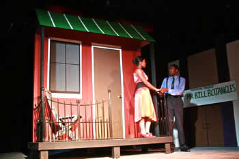 Rotisha Hazelwood (Juliet) and Derek Cheatham (Romeo) enact the famous balcony scene.