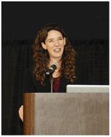 Photo of speaker at SMART Office's 2010 Symposium. Photo of speaker at SMART Office's 2010 Symposium.