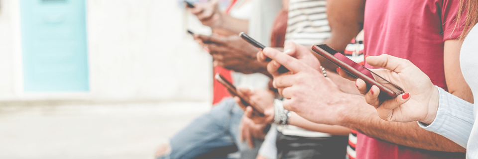 People looking at their phones